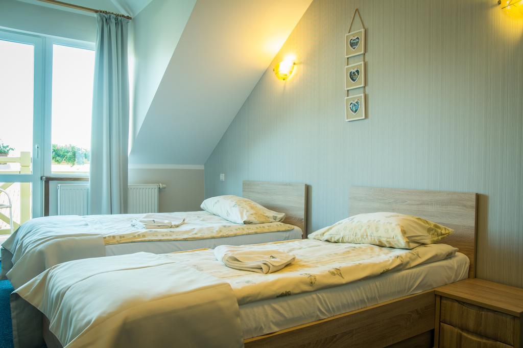 Bed and Breakfast Sloneczny Port Mikołajki Habitación foto